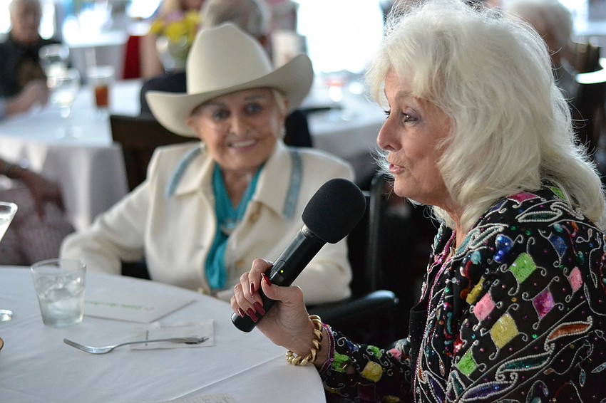 Susan Randall addresses guests and shares her favorite memories of Edith.
