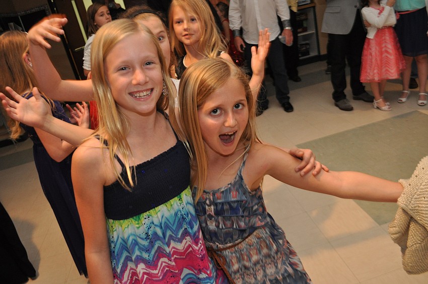 Sydney Rice and Ryann Hilyer dance together.