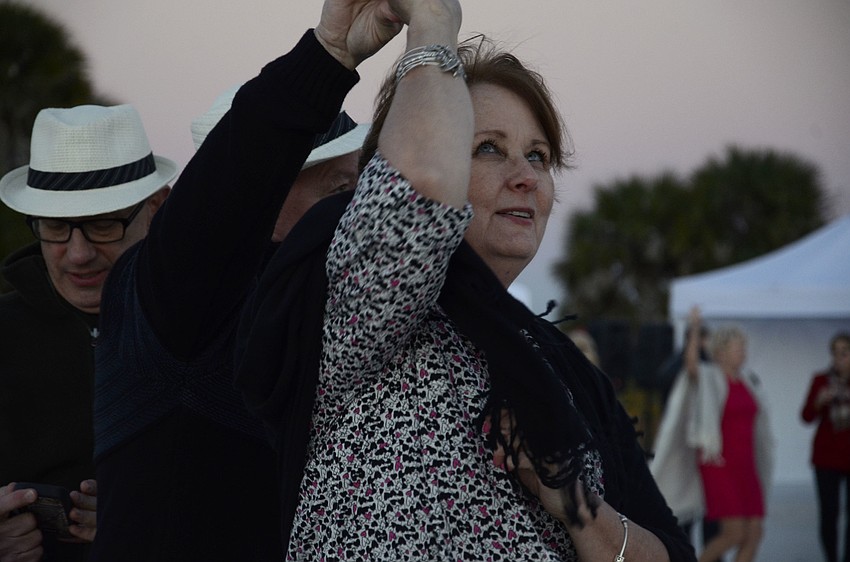 Helen Balogh and her husband, Laz, danced on the beach after the event.