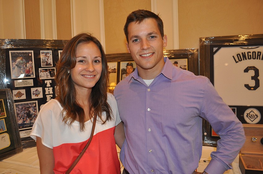 Alyson Morgans and Michael Ferrone browsed auction items.