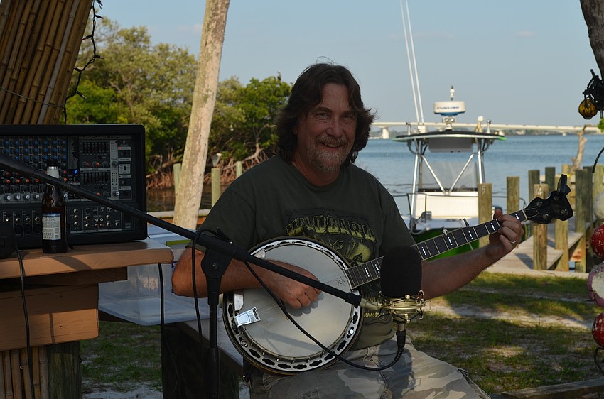 Dave Schmitz performs.