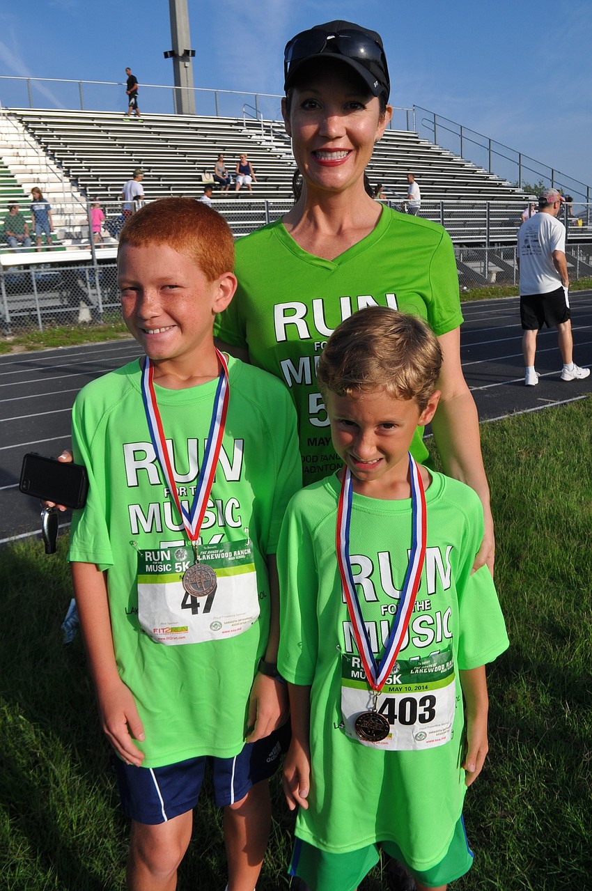 Holly Gullett attends with her children, Benjamin, 9, and Jesse, 6.