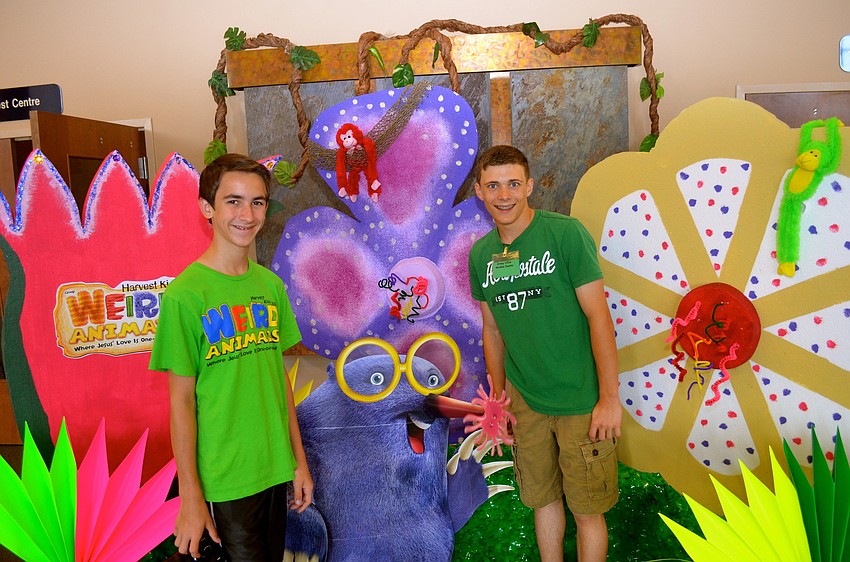 Jordan Conellias and Gray Ellis adjust the props.