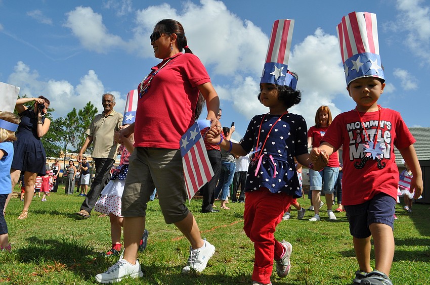 Tanvi Mathura and William Downie march together.