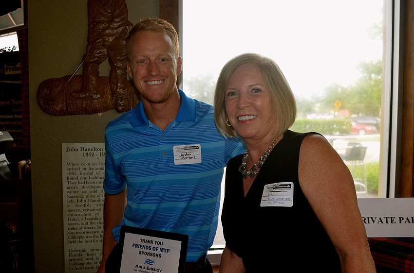 Jordan Keetons and Ann Campbell share laughs before dinner.