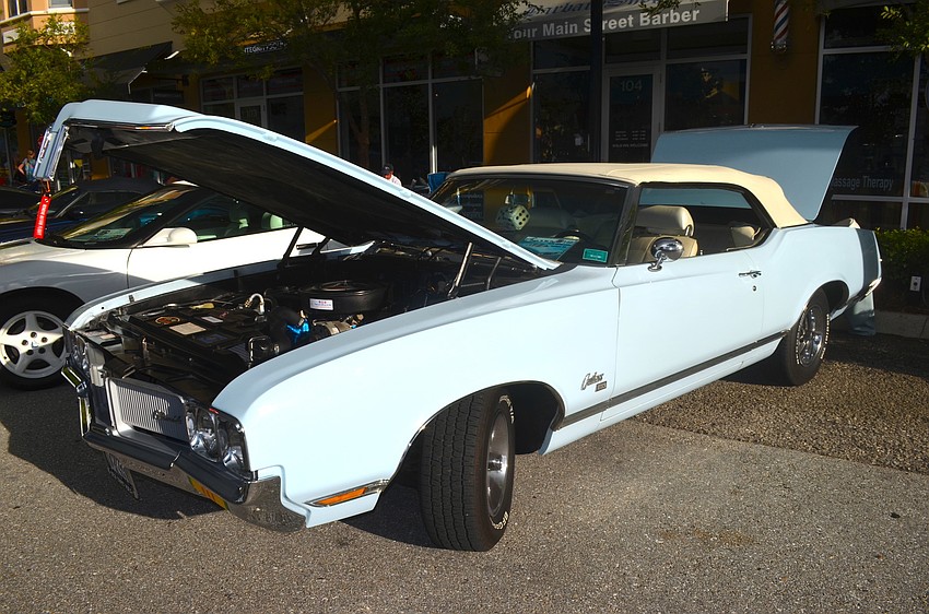 A vintage Cutlass shows off what's under its hood.
