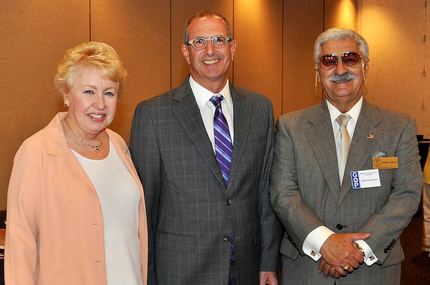 Republican Womenâ€™s Club of Sarasota president Carol Sawyer, featured speaker Mark Chait and Anthony Sawyer