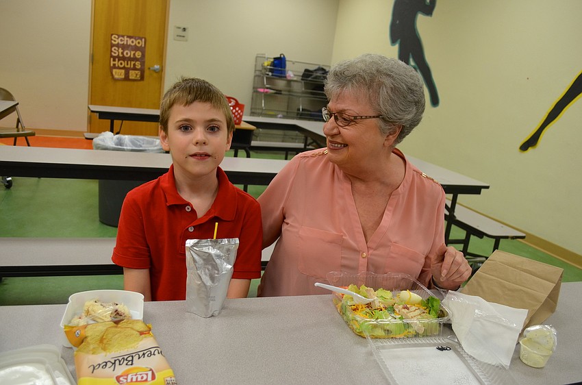 Logan and Nadine Odonnell take a break from lunch to talk.