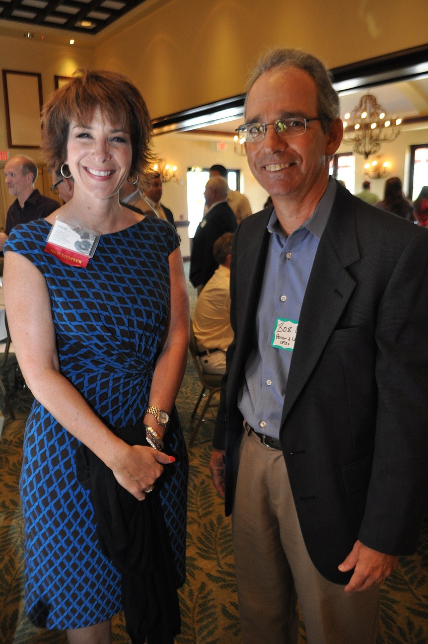 Mary Kay consultant Danielle Hugo meets Bob Low, of Perron & Low CFOs.