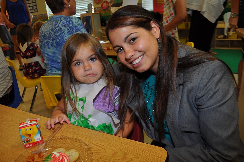 Mia Wolcott hangs out with her mom, Ashlyn Gueits.