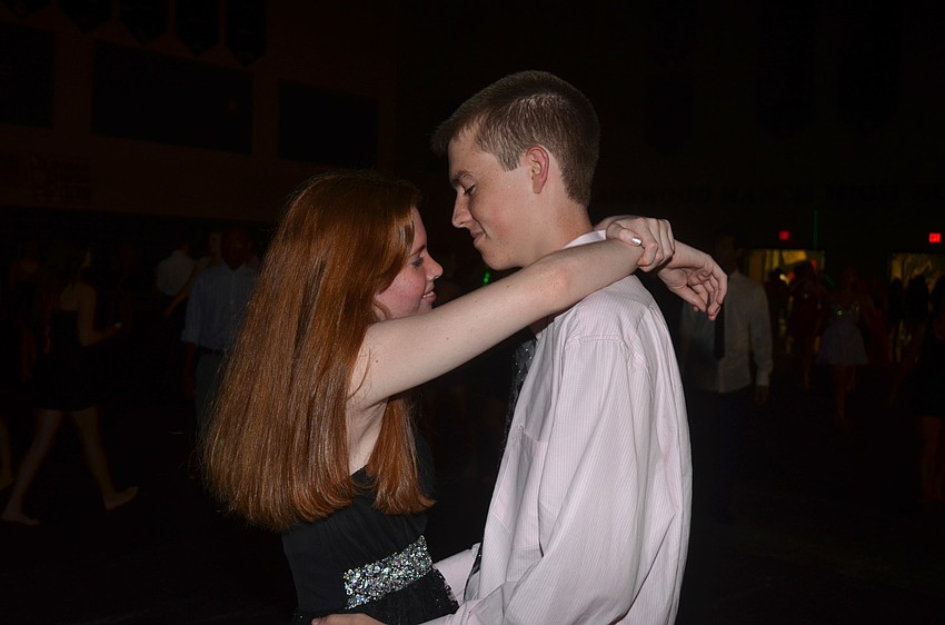 Nicole Slade dances with her date, Caleb VanRiper.