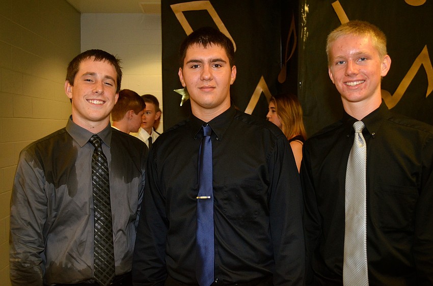 Joseph Resnick, Jon Latine and Jackson Newby show off their outfits.