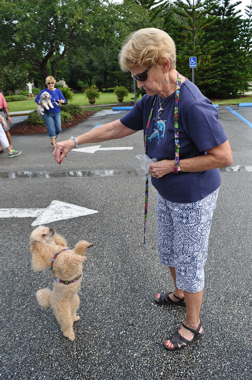 Rosemary Jones shows off Angelâ€™s dancing tricks.