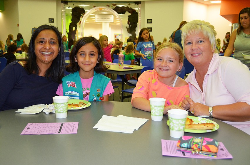 Vaishalee Wilson and her daughter Priya attend Scout About the Library with Victoria Huckestein and her daughter Mikaila.