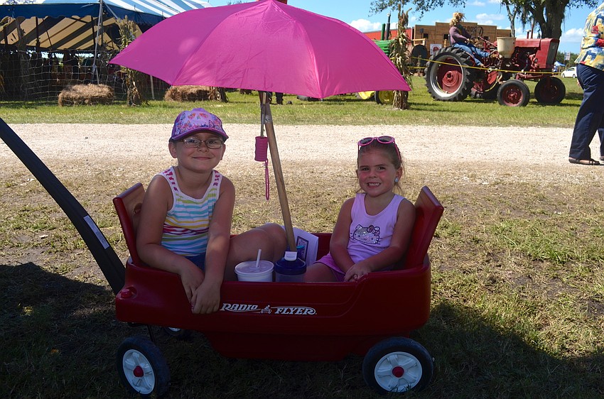 Jenna Canaday and Cali Dyal cool down in the shade.