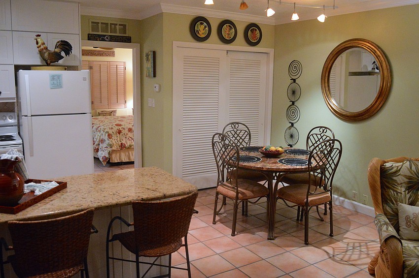 The kitchen and dining room area of one of the Diplomat Beach Resortâ€™s newly refurbished rooms.