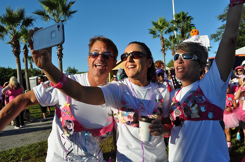 Charlie Coury, Virginie Breuer and Doreen Karras, of Tropicanaâ€™s team, create a video of themselves and the rest of their team to share with Sandi â€œSamandiâ€ Miller, for whom they are walking.