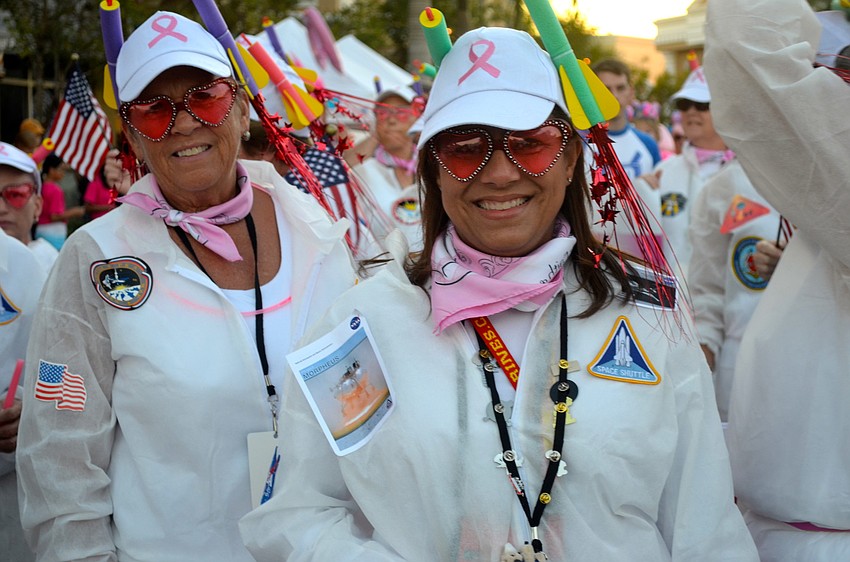 Becky Dukes and Maribel Soper show their pink pride.