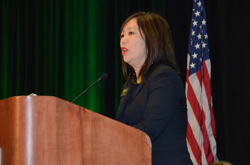 Lisl Liang addresses guest for the last time as Board Chair.