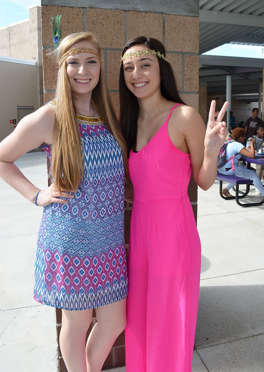 Sophie North dressed for the roaring 20s and Taylor Balcom dressed as a hippie.