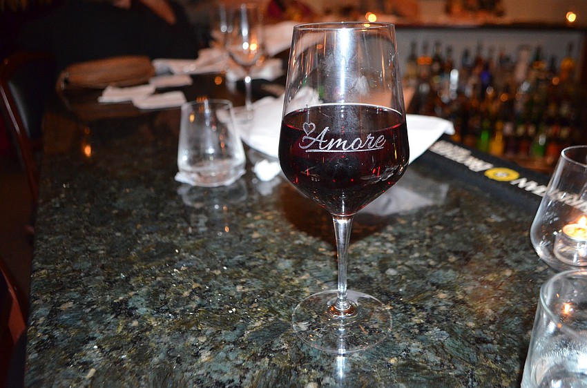 Each wineglass is etched with â€œAmore.â€