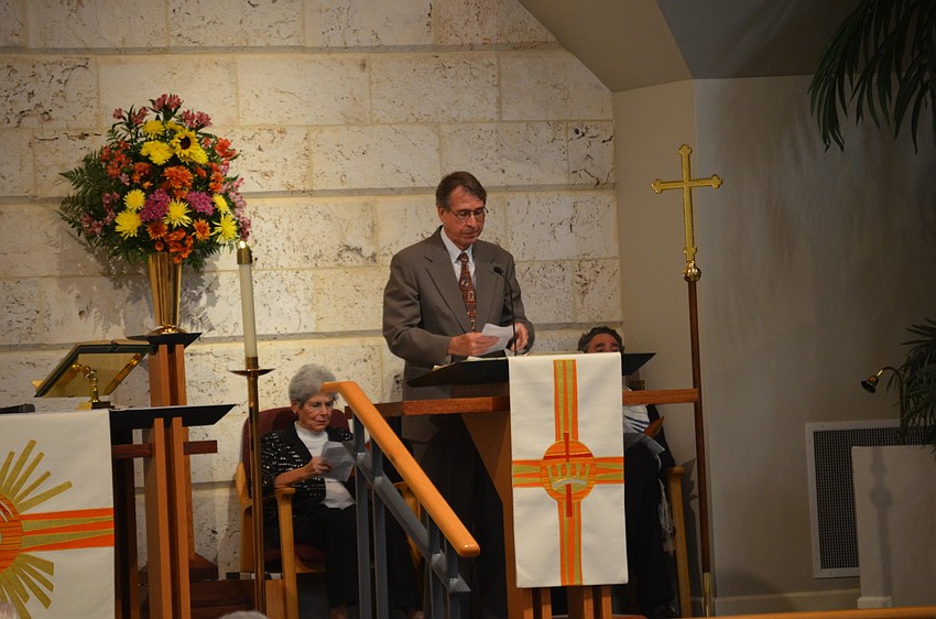 Sean McGrath, of St. Mary, Star of the Sea, Catholic Church, gives a Litany of Thanksgiving.