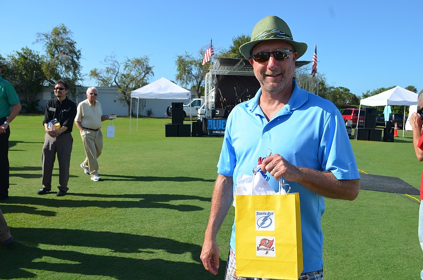 Dave Rogers won the fifth prize of the raffle, â€œBucs and Bolts Tampa Getaway.â€