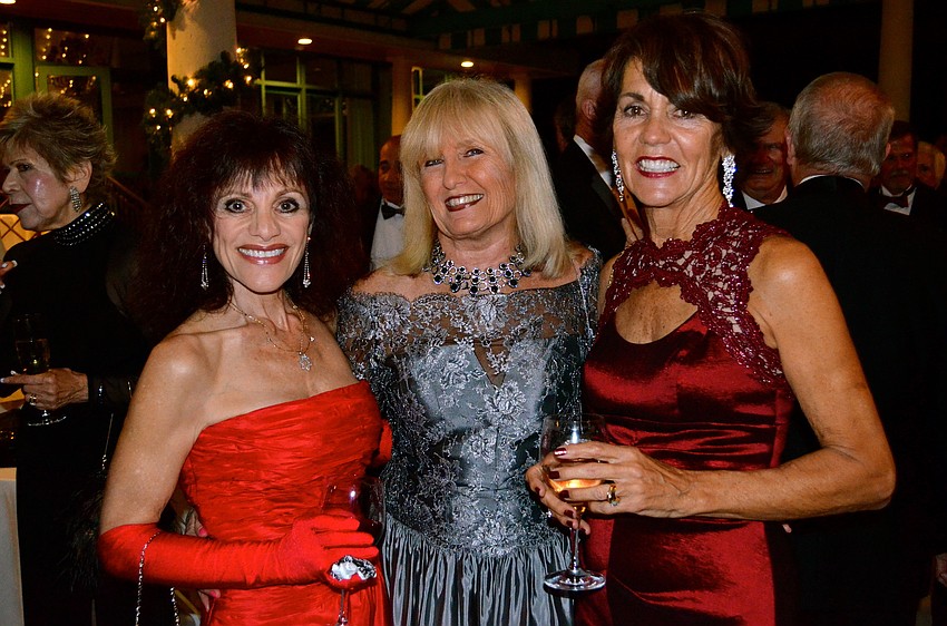 Rebecca Freedman, Bonnie Femec and Jane Krombeen show off their outfits.