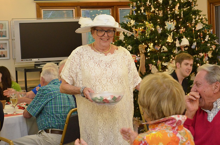 Jan Webb dressed as â€œSuzy Snowflakeâ€ to give out candy and kisses to guests.
