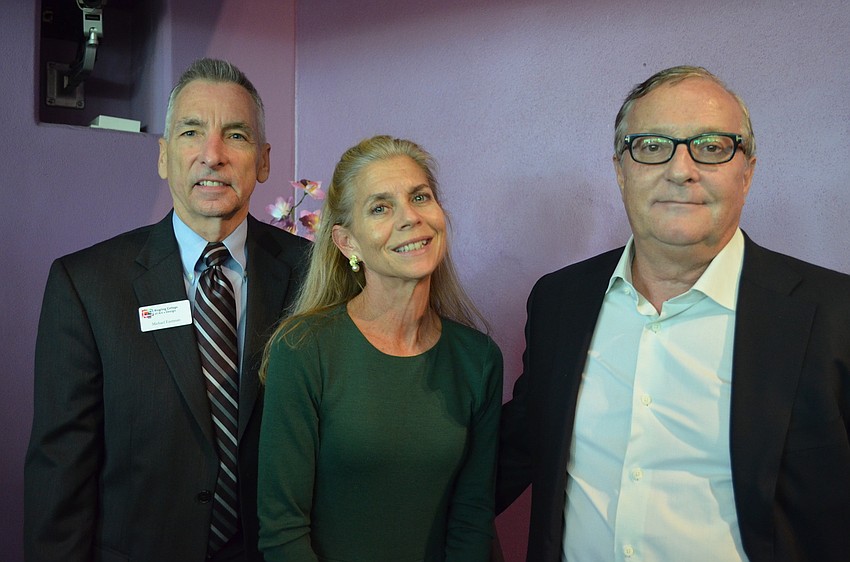 Michael Eastman with Susan and Bob Girard.