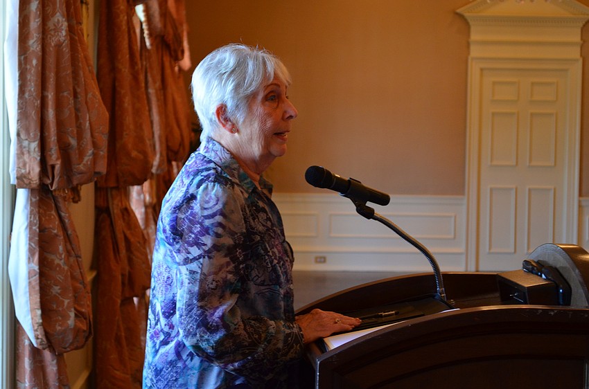 Joan Scheller addresses the group and starts the day off with a few jokes.