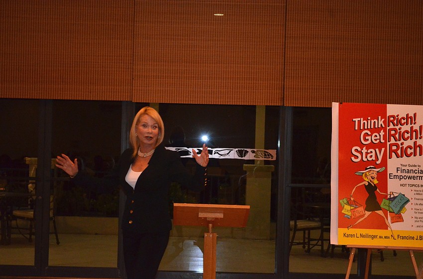 Francine Blum speaks to the audience.