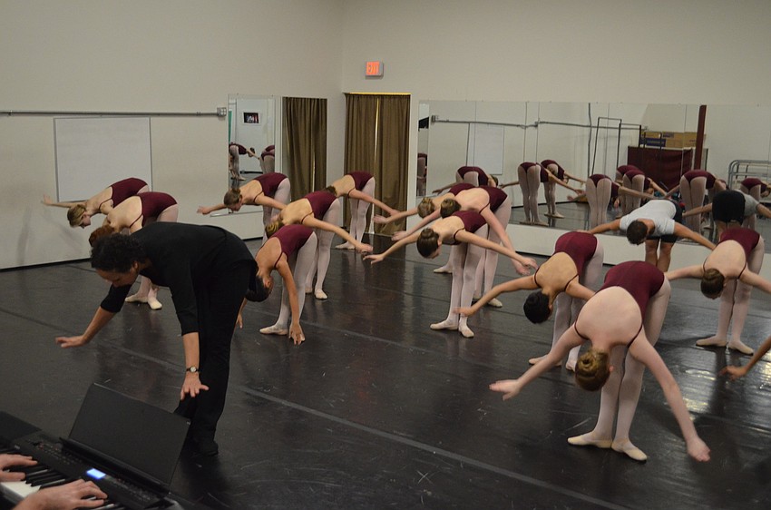 Virginia Johnson and the class conclude the lesson with a bow.