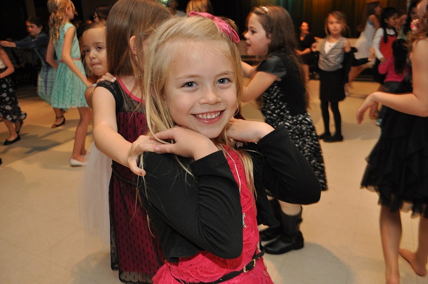 Brooke Greer, 5, leads a conga line.