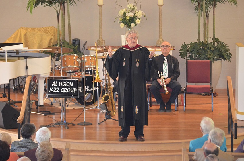 The Rev. Vincent Carroll speaks to the congregation.