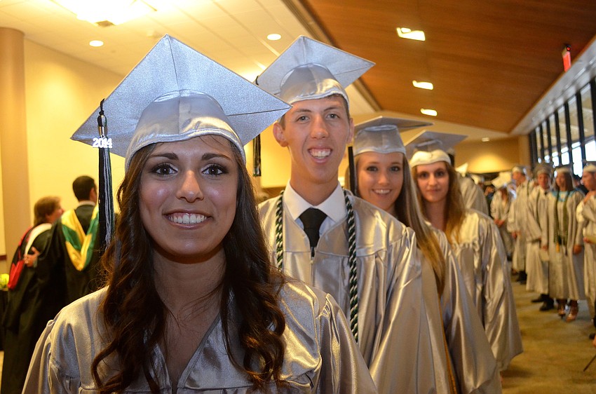 Amy Alvarez, Mitch Arnold, Ashley Blakemore and Briana Boese find their spots in line.