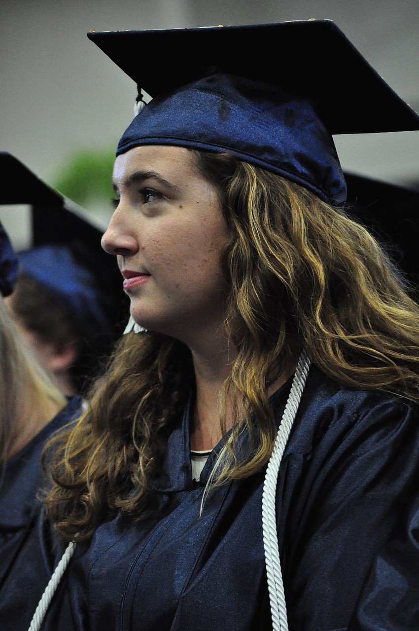 Natalie Chiat watches the first student speaker.