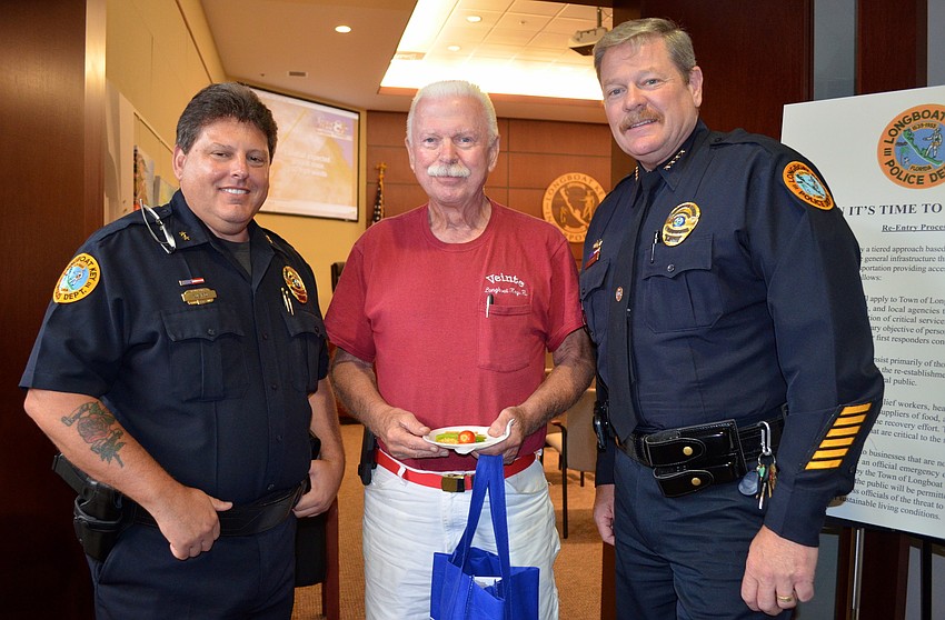 Deputy Chief Frank Rubino, Charlie Barnett and Police Chief Pete Cumming