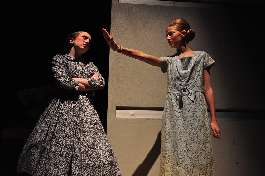 Amber Von Tussle, played by Laura McKenna, argues with her mother, Velma Von Tussle, played by Abbie Dietz.