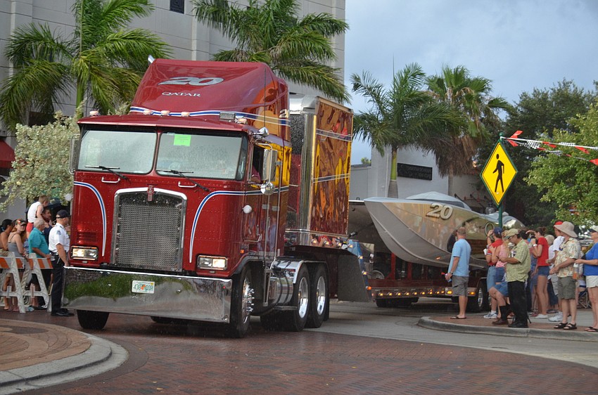 Trucks carrying the super boats had a difficult time at Five Points roundabout.