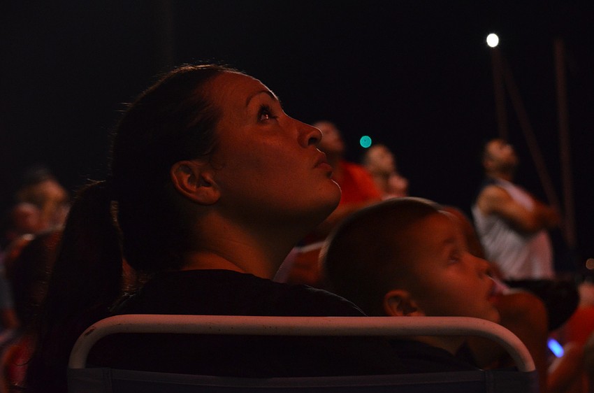 Sharon Smith watches the fireworks with Mariano Santiego.