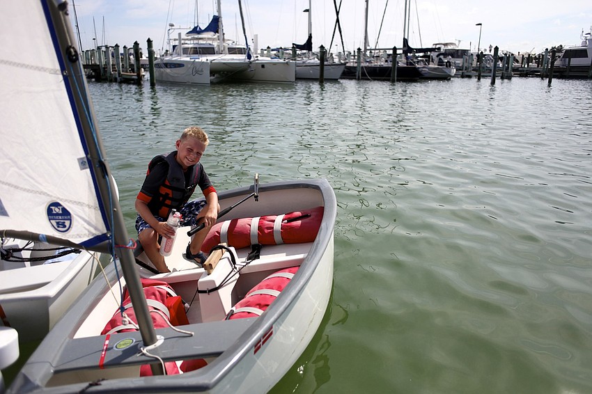 Jack Flovig, 8, smiles before the morning sail.