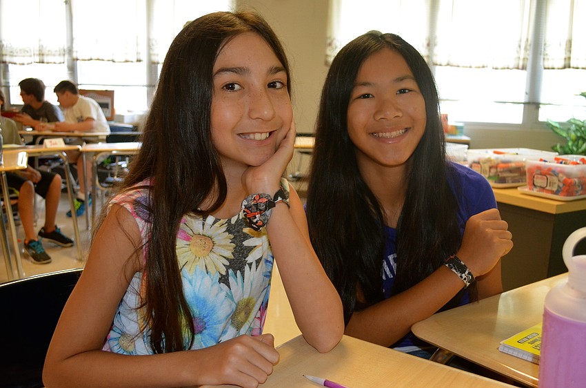 Angelina Cotto and Julia Kroos-Roberts chat while waiting for the next assignment.