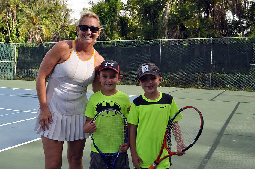 Bath & Racquet tennis director Holly Holton Moore with Chase and Cole Evanoff