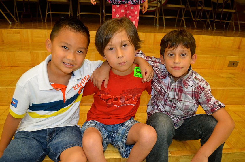 Torrey Truong, Collin Ickes and Dominic Matute make new friends at the social.