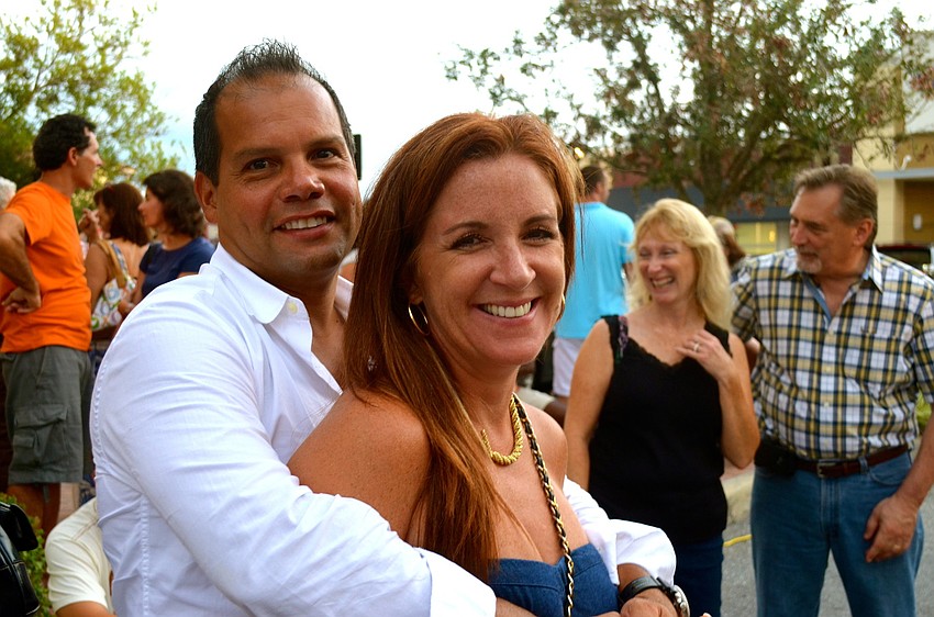 Eric and Annemaria Medina cozy up and listen to music.