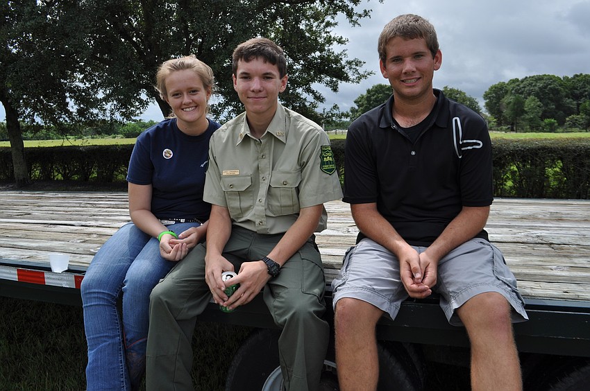 Taylor Noble, Jared Longabach and Camron Danforth relax together.