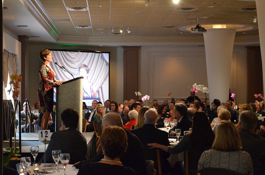2014 honoree Cathy Layton addresses the audience after receiving the 2014 SCOPE Boundary Crosser Award.