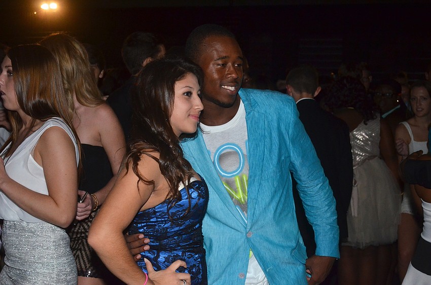 Leticia Ortega poses for a picture with Tyree Rome.