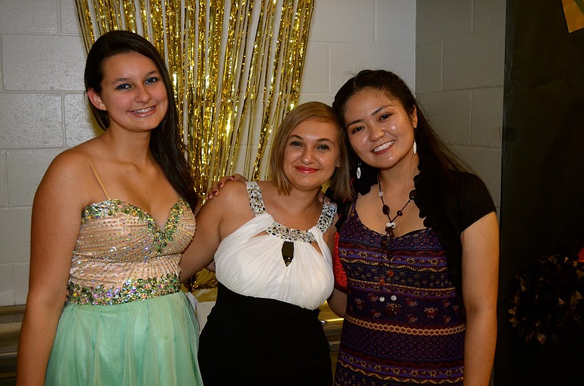 Katelyn Molter, Kristen Moreno and Aiko Sturgis get ready to go dance.